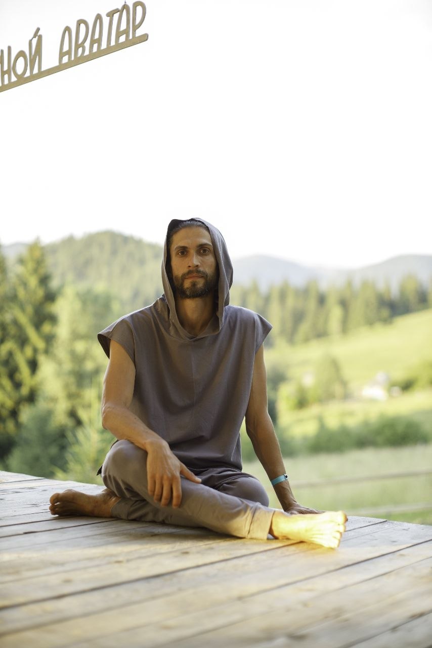 Holistic Massage practitioner outdoors before a session